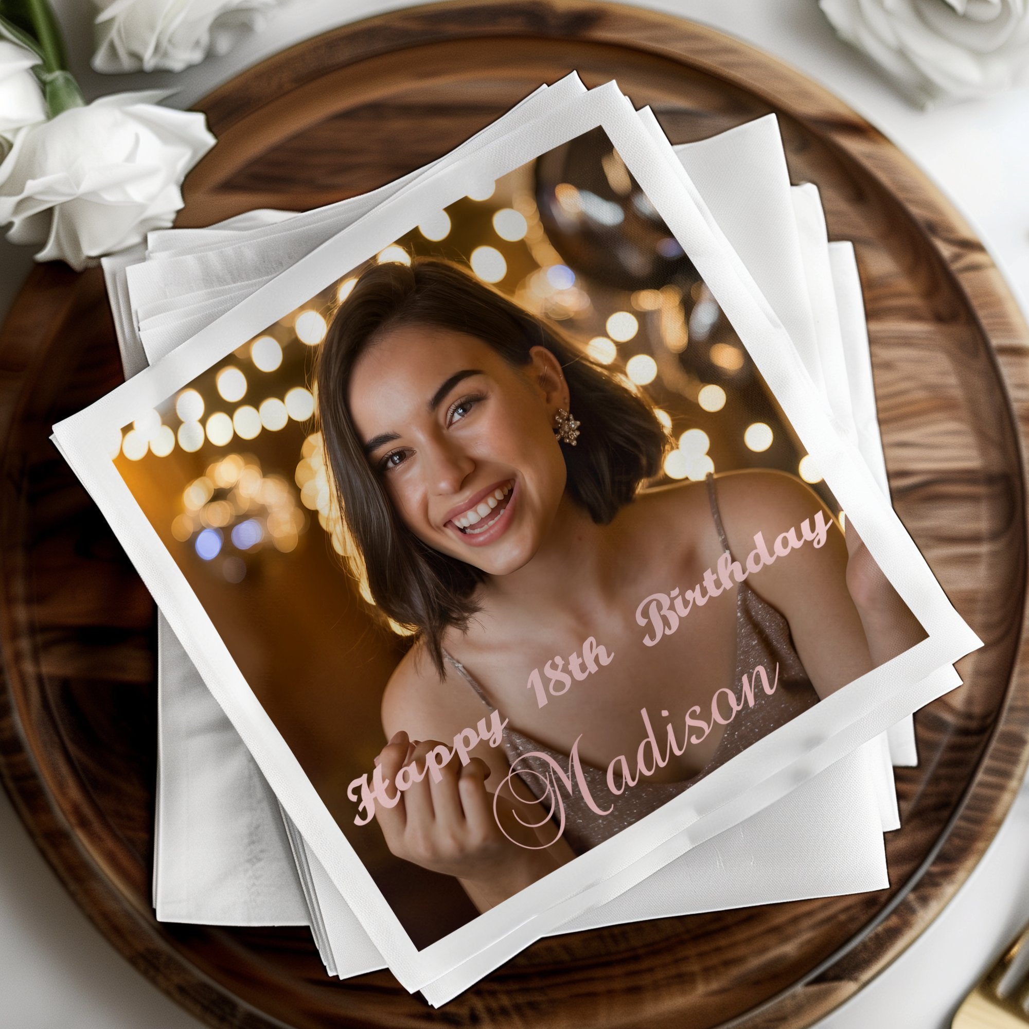 Happy 18th Birthday Madison photo on a stack of napkins.
