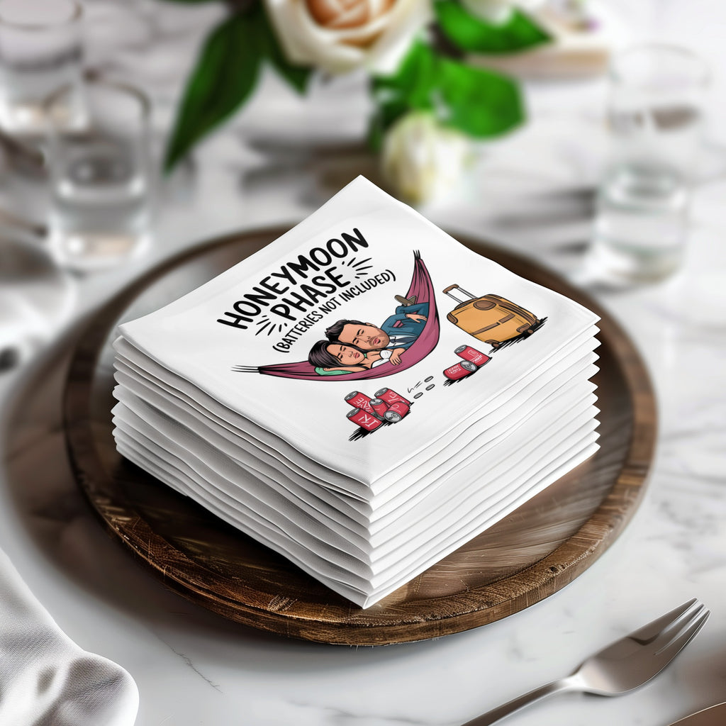 Stack of folded white napkins with cartoon illustration of person in hammock.
