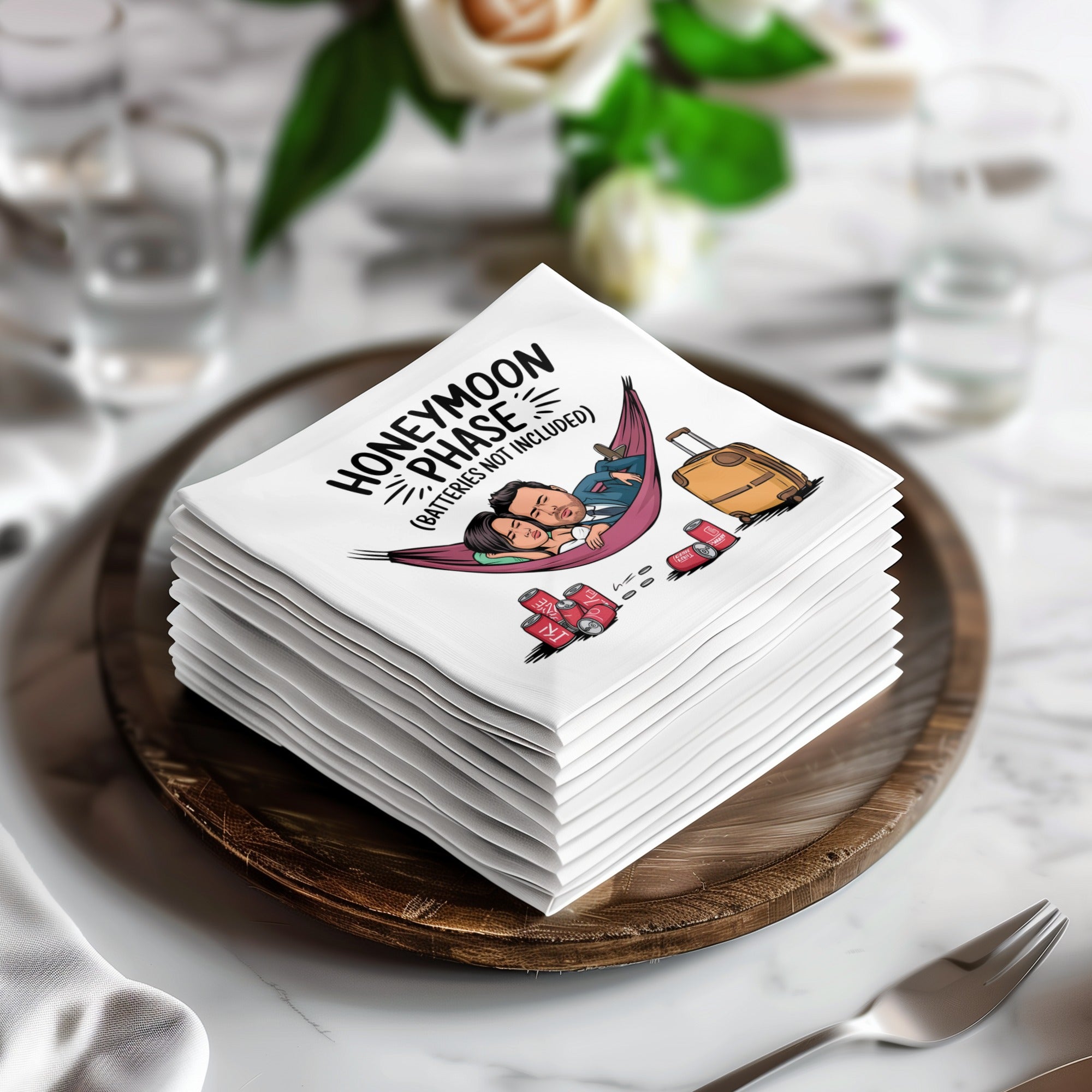 Stack of folded white napkins with cartoon illustration of person in hammock.