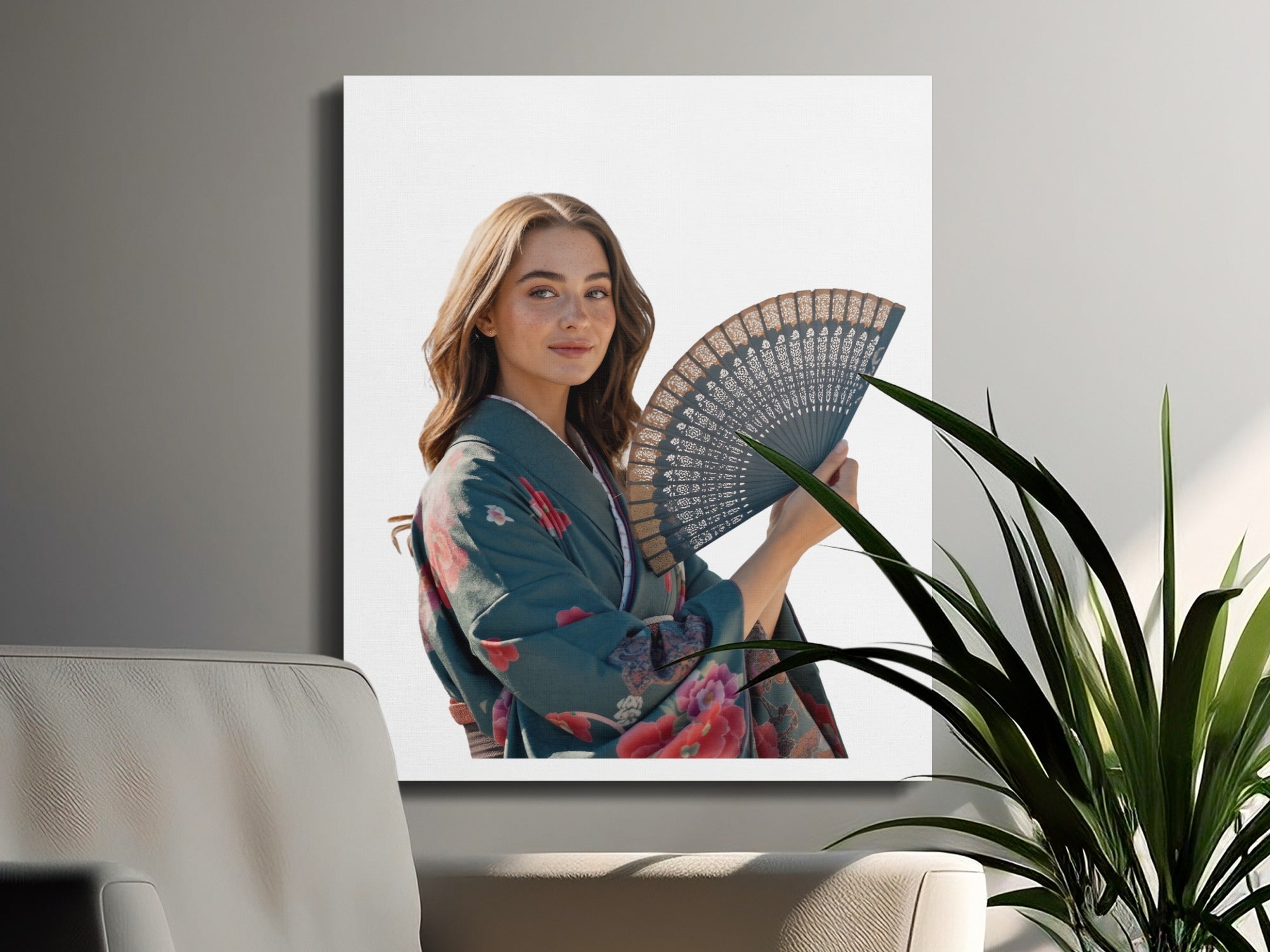 Woman in kimono holding a decorative fan, looking at the camera.