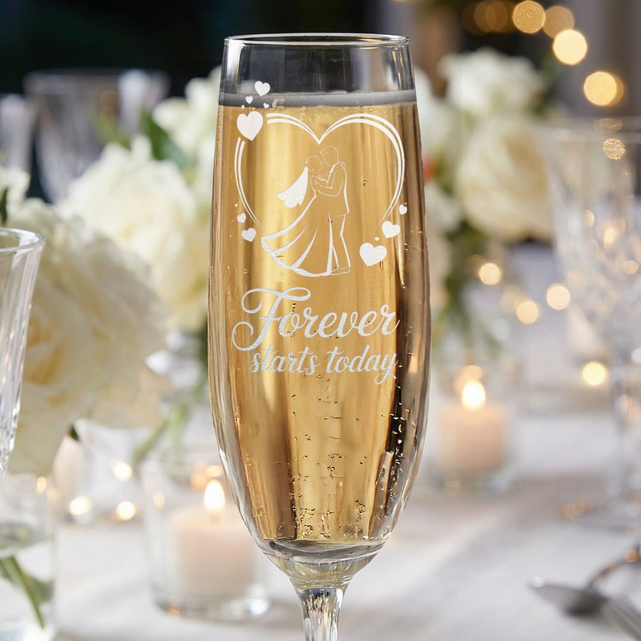 Champagne flute with wedding couple silhouette and "Forever starts today" text.
