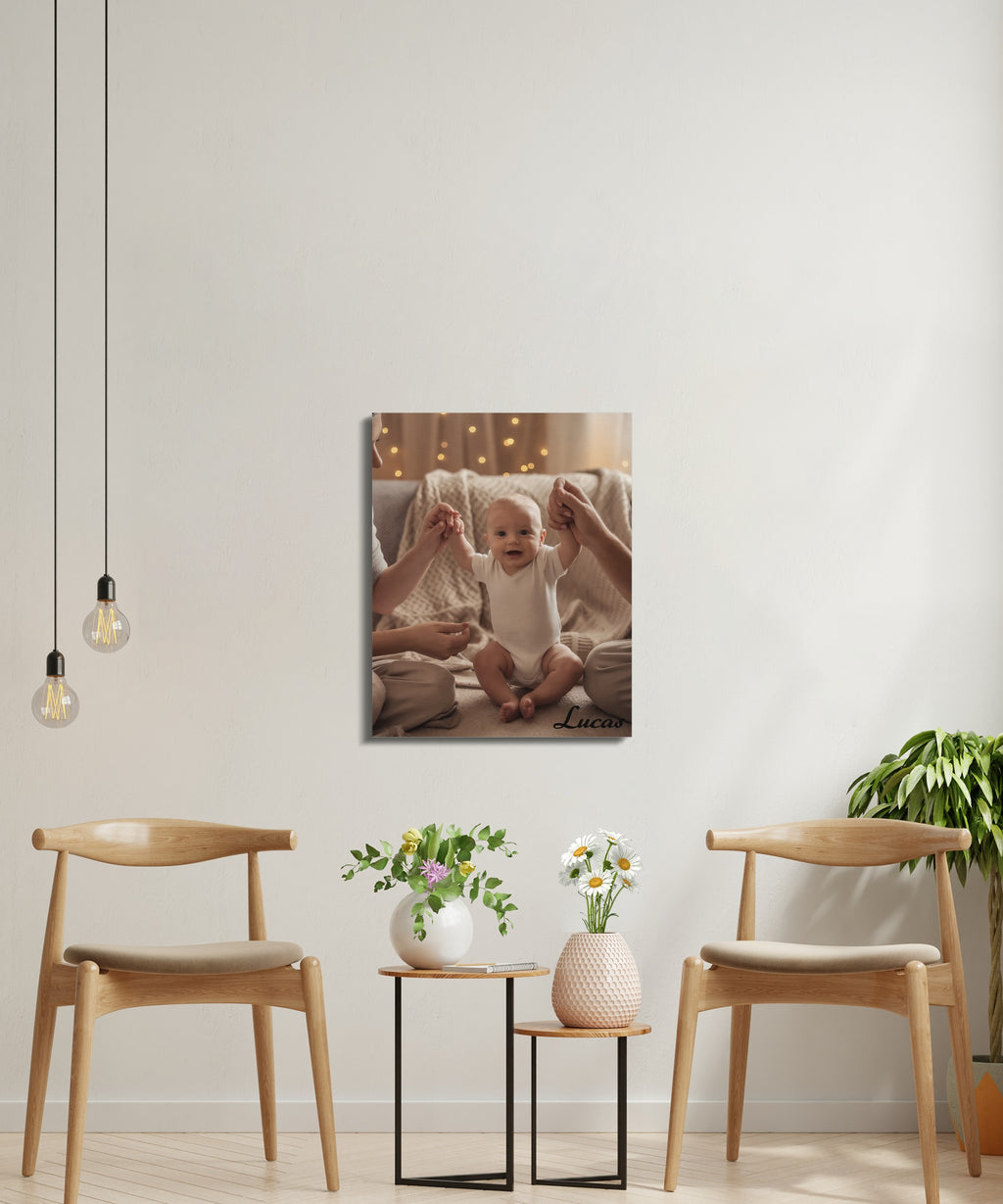 Baby sitting with hands held up, framed on wall.