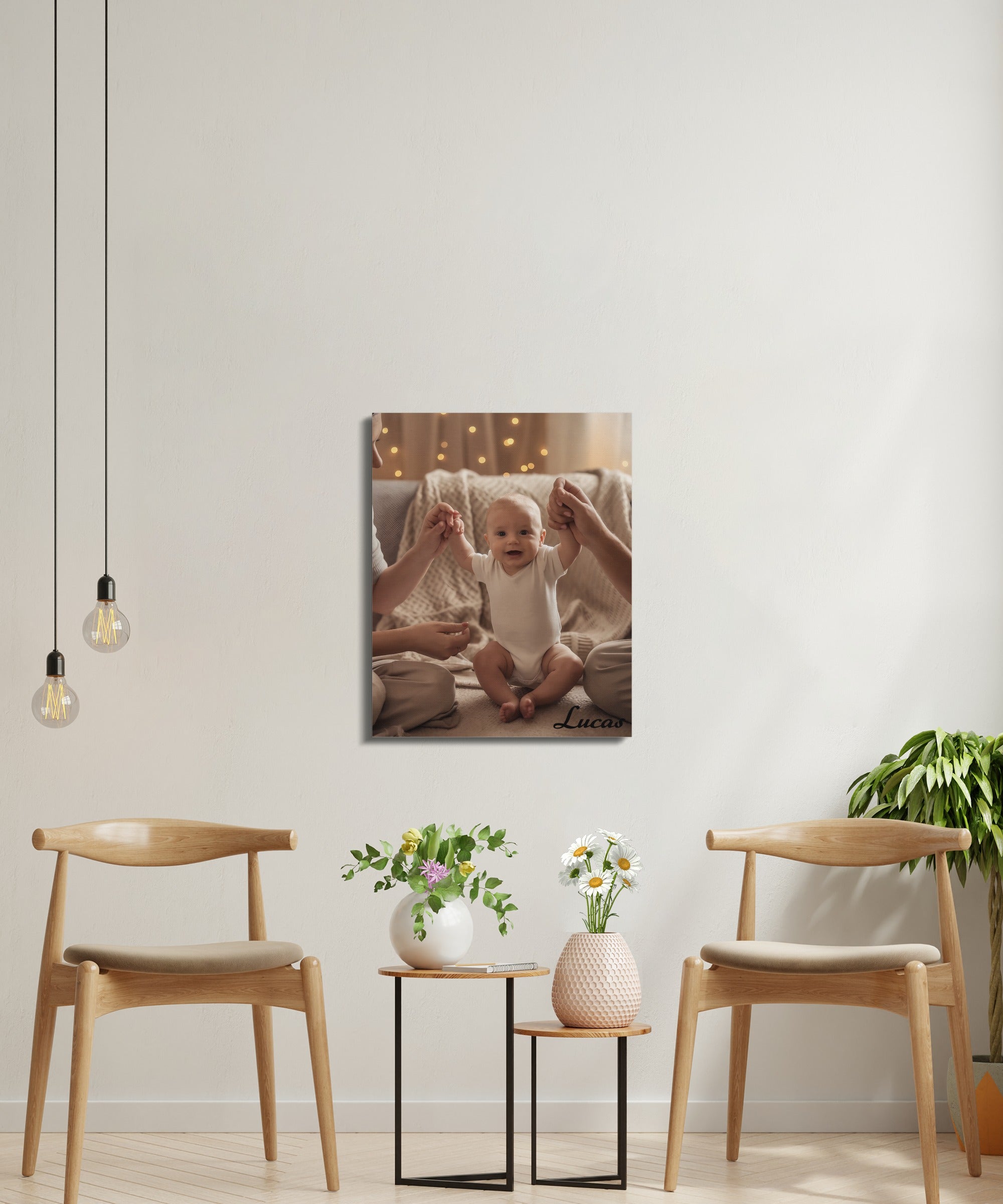 Baby sitting with hands held up, framed on wall.