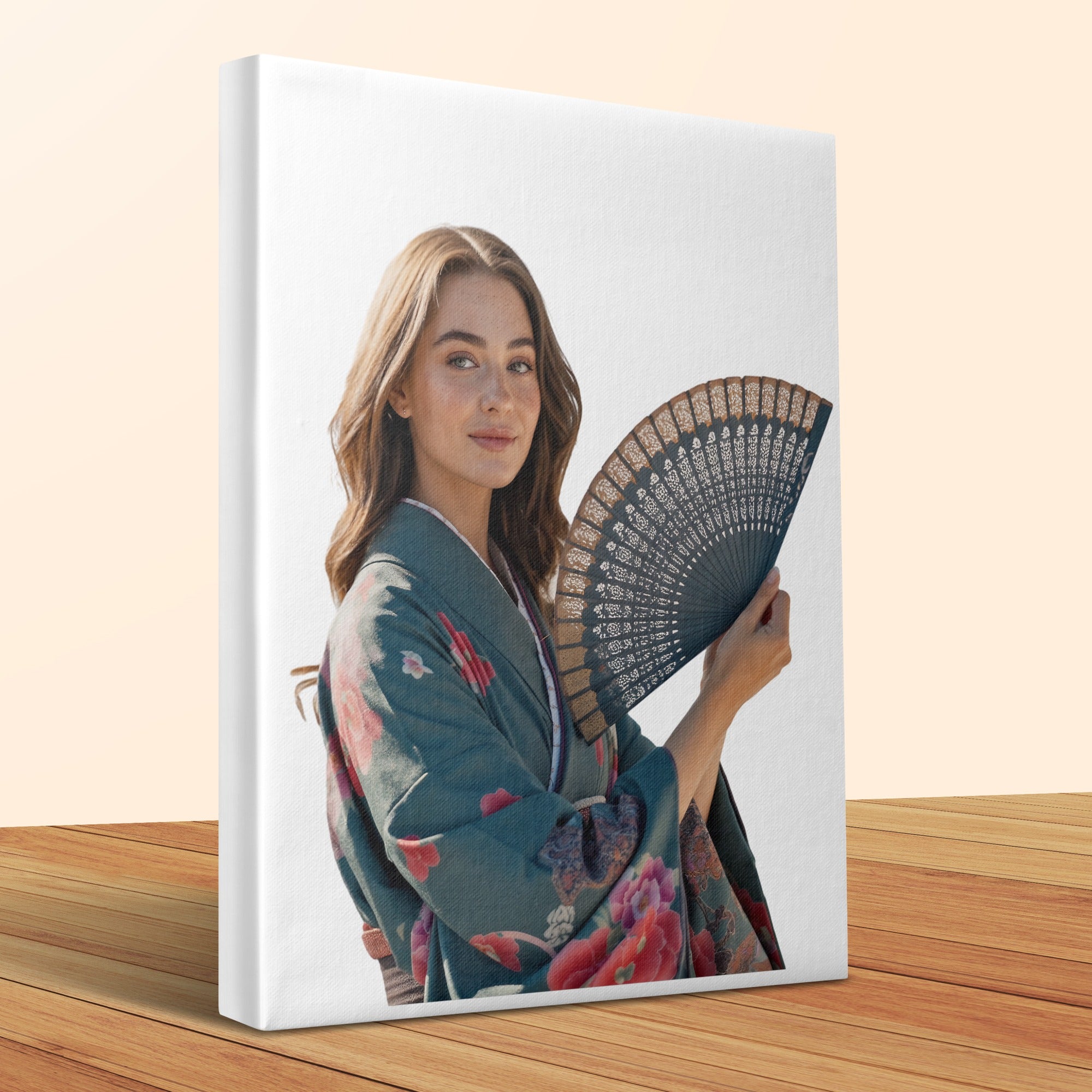 Woman in floral kimono holding decorative fan, looking at camera.