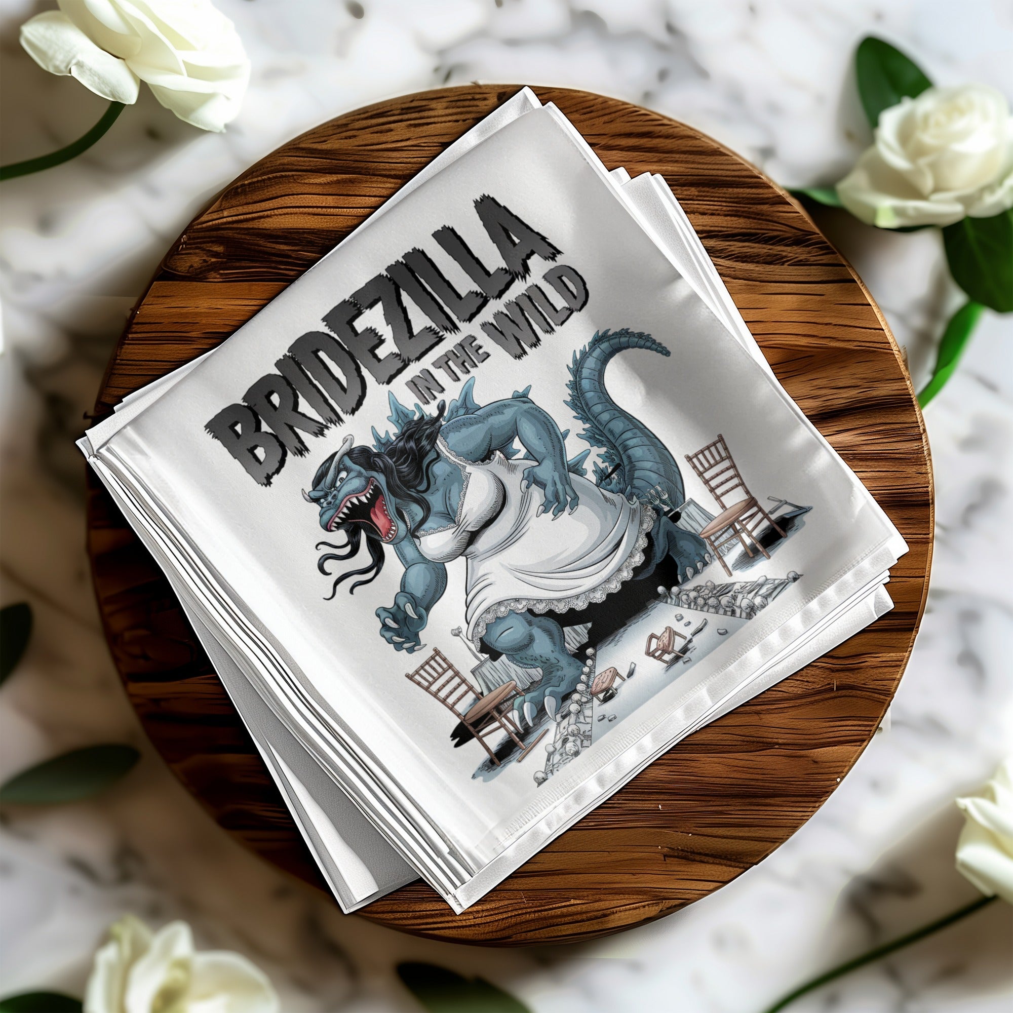 Bridezilla in the Wild graphic on a white folded cloth, surrounded by roses.