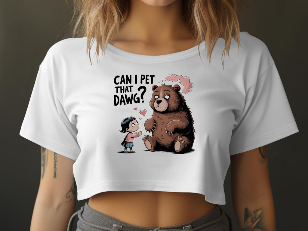 Woman in white crop top with bear and girl graphic saying "Can I pet that dawg?".
