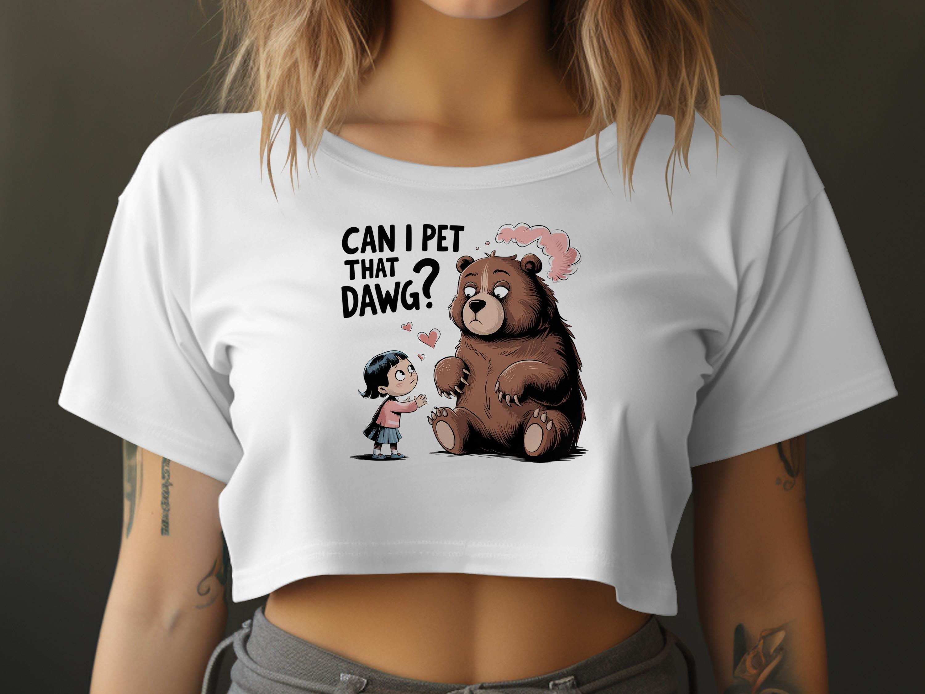 Woman in white crop top with bear and girl graphic saying "Can I pet that dawg?".