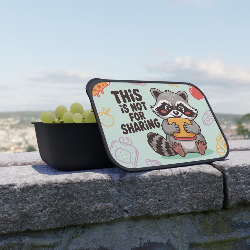 Lunchbox with raccoon and text "THIS IS NOT FOR SHARING".