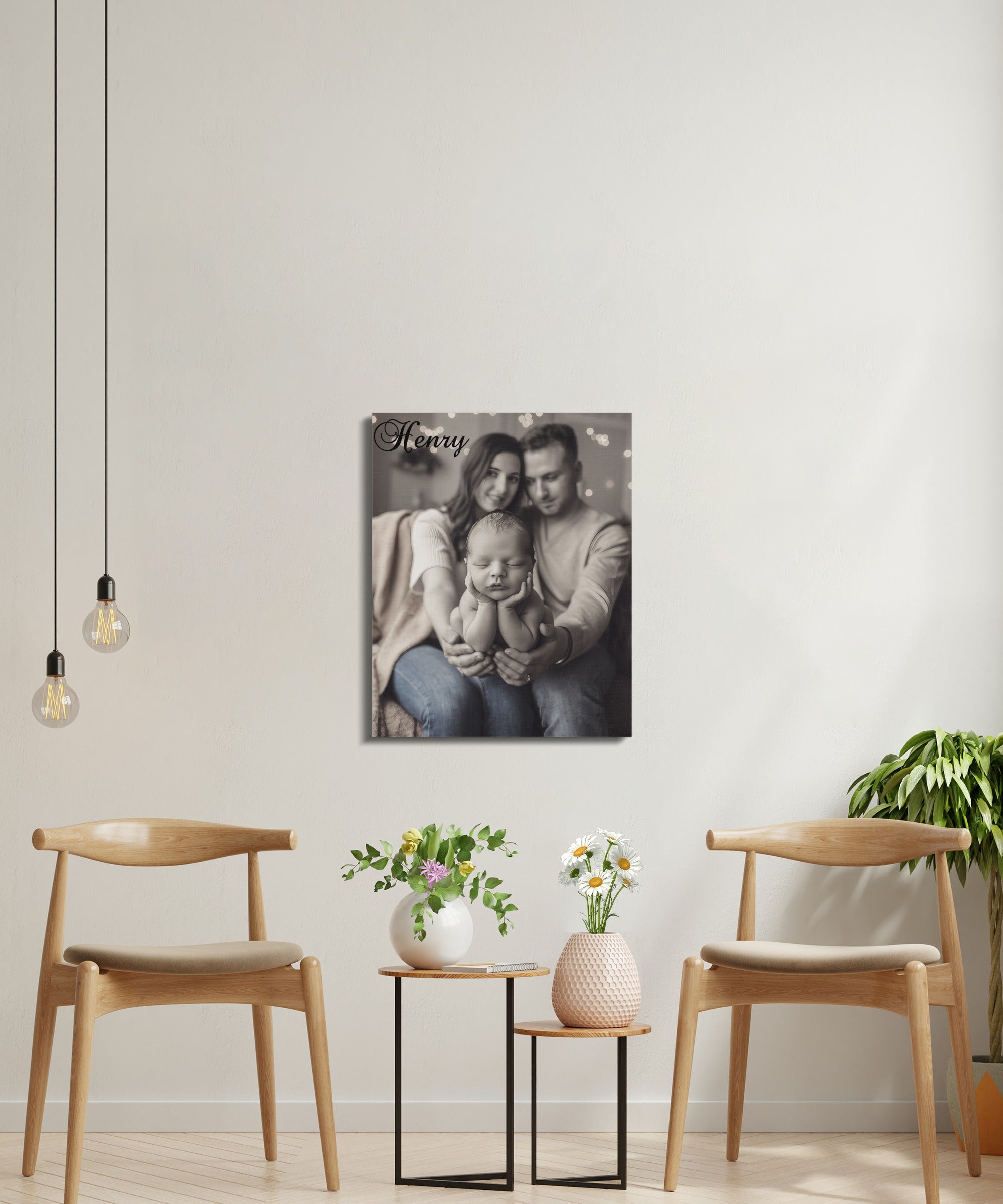 Framed photo of a family holding a baby, with the name "Henry" in cursive.