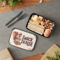 Lunchbox with sandwich, cheese, pistachios, and tangerines, featuring "Snack Dealer" text.