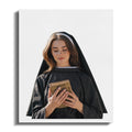 Young woman in nun's habit holding an open book.