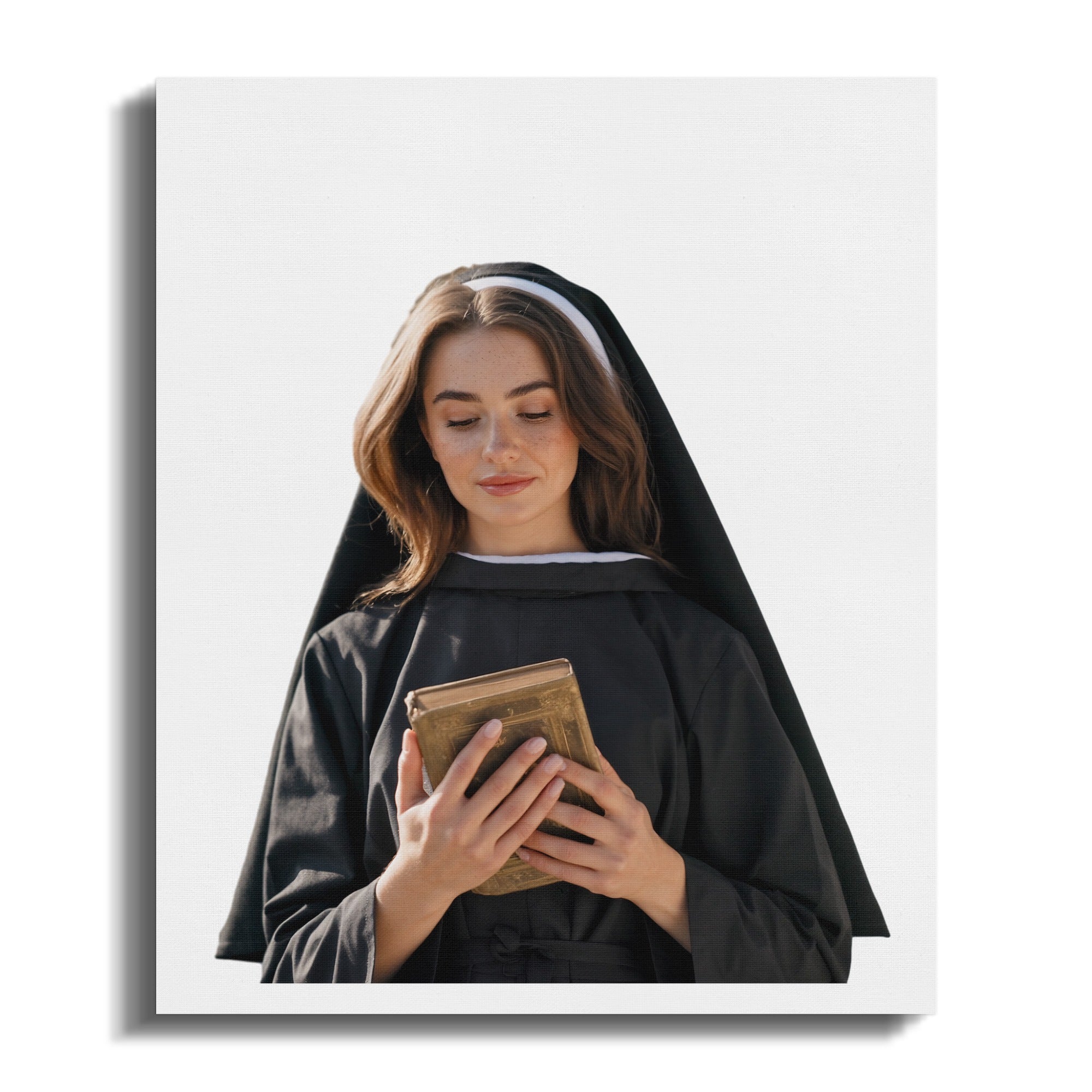 Young woman in nun's habit holding an open book.