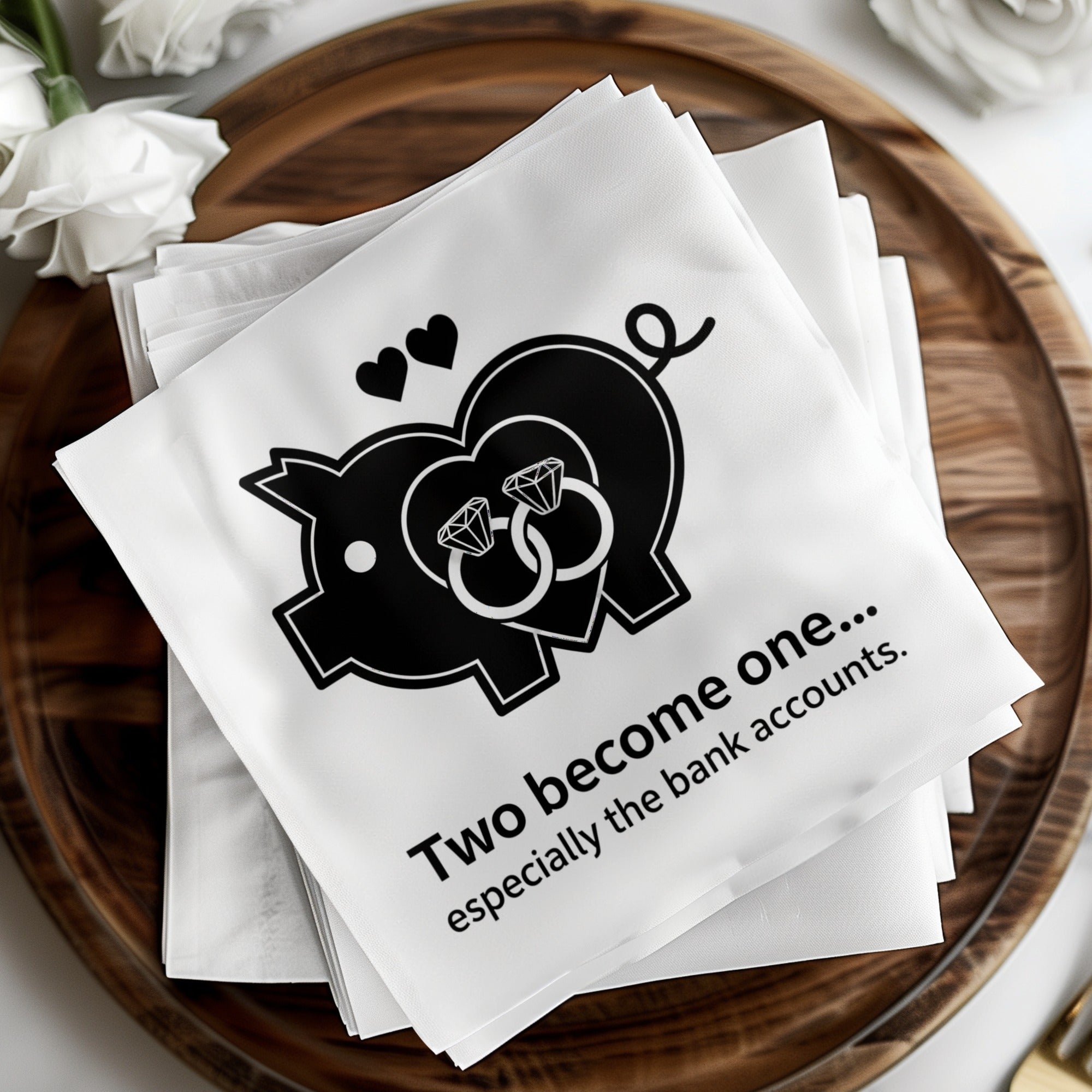 Wedding napkins with a pig and rings graphic and text "Two become one..."