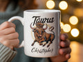 White mug with Taurus bull wearing a crown and "Christopher" text.