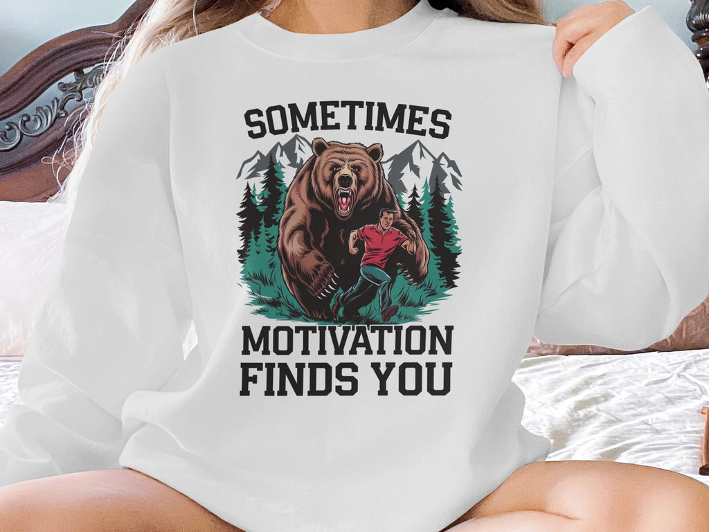 Bear chasing a man with text "Sometimes Motivation Finds You."