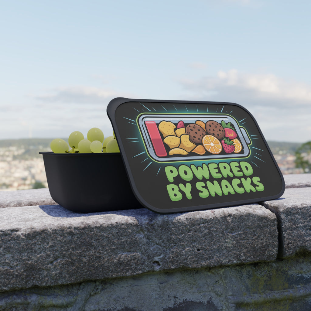 Snack container with battery graphic and text "POWERED BY SNACKS."