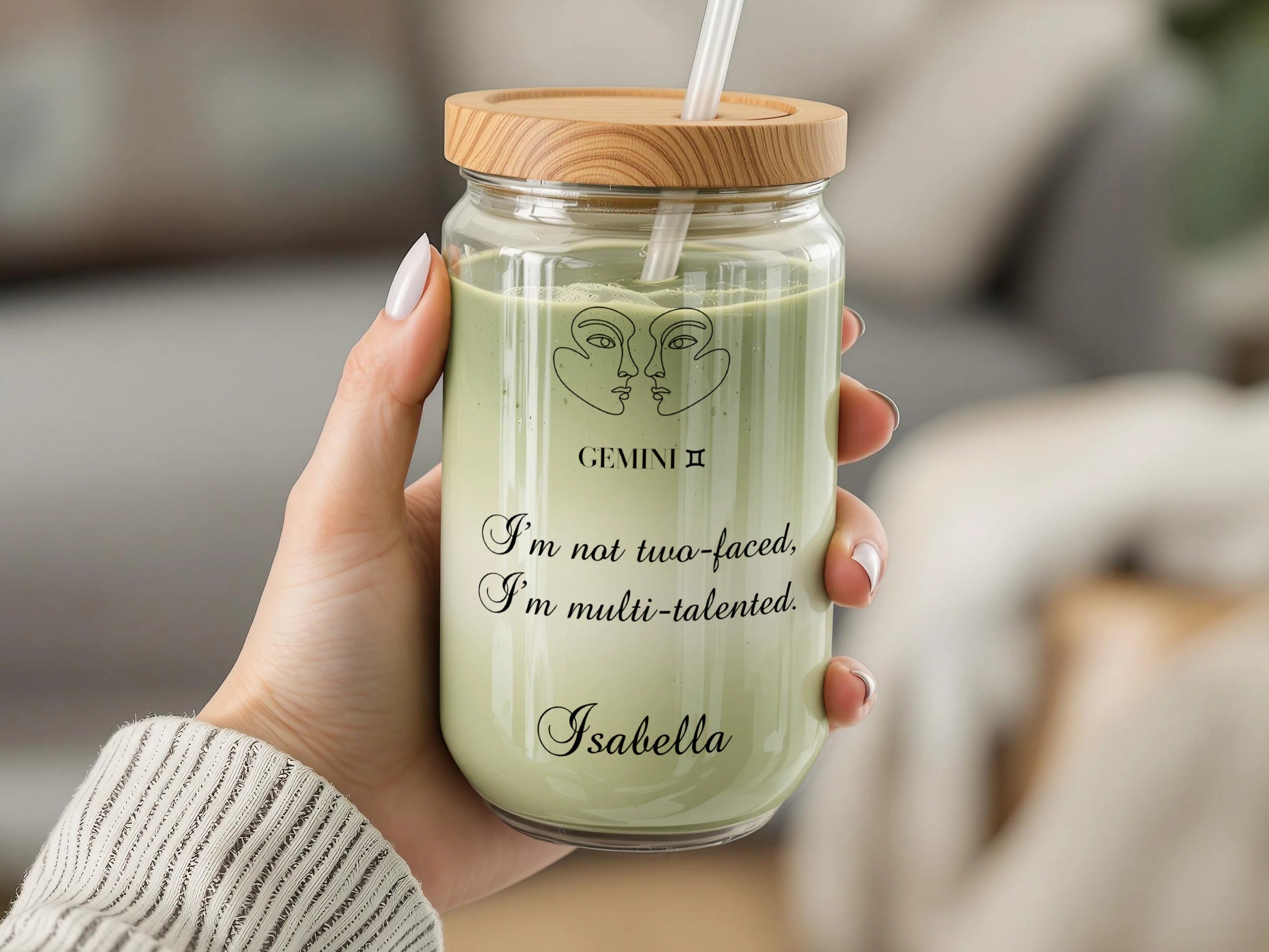 Glass tumbler with Gemini symbol and quote, personalized with "Isabella."