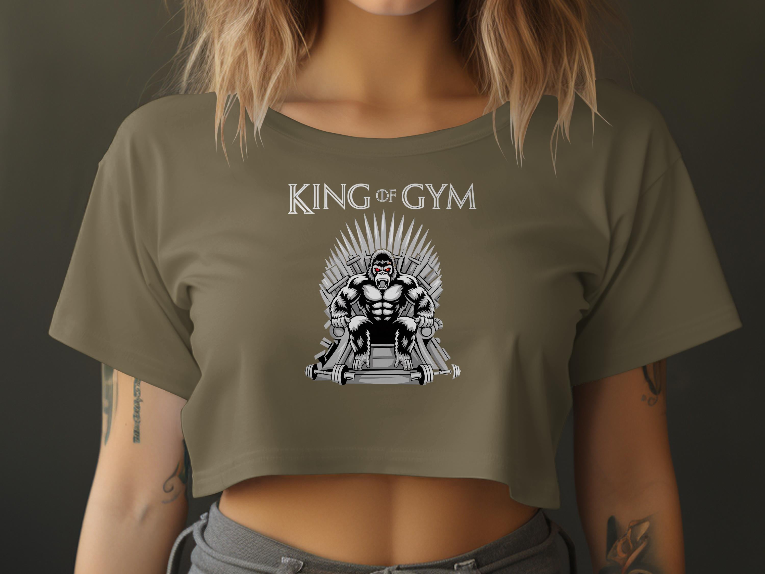 King of Gym cropped t-shirt with gorilla on throne graphic.