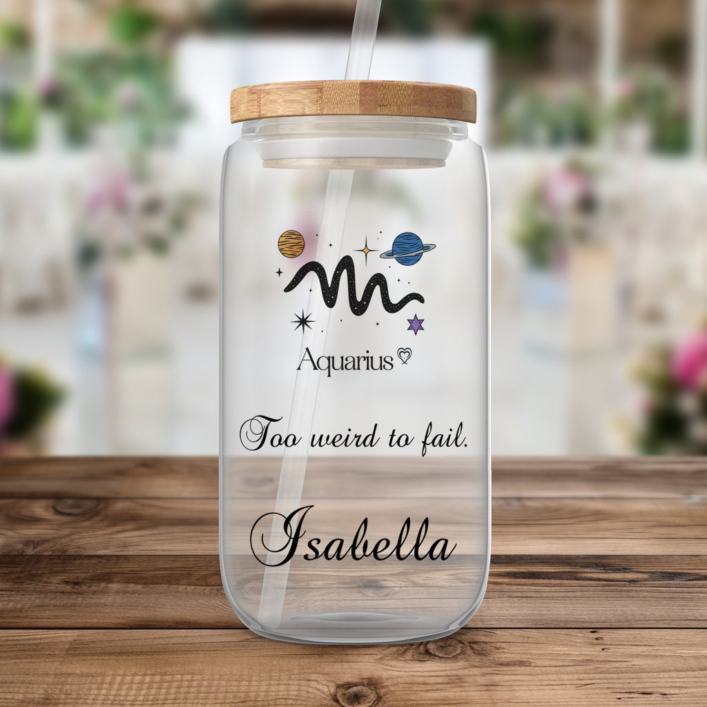 Glass tumbler with Aquarius zodiac symbol, stars, and "Too weird to fail" text.