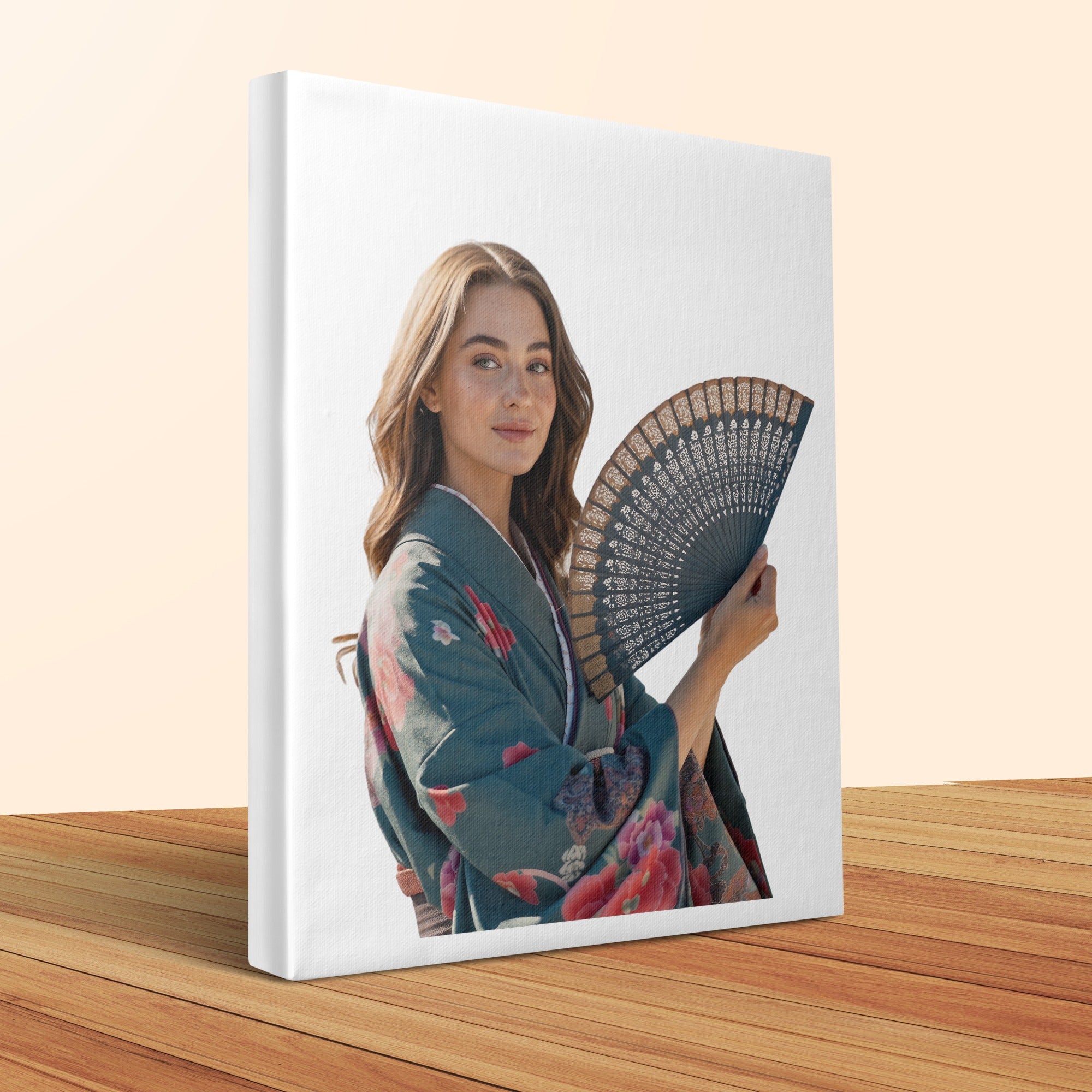 Woman in a floral kimono holding an ornate black fan.
