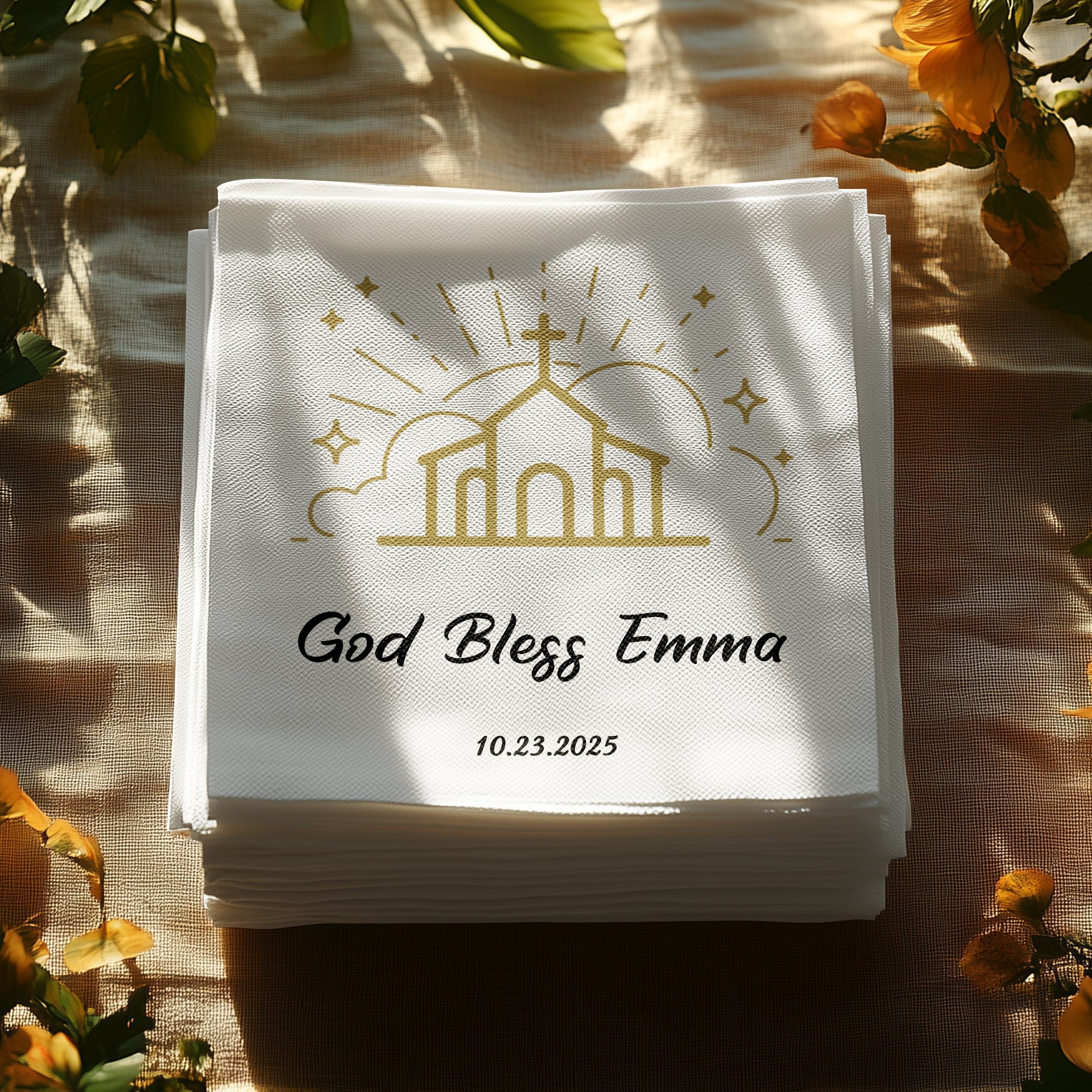 Stack of white napkins with "God Bless Emma" and "10.23.2025" text, church graphic.