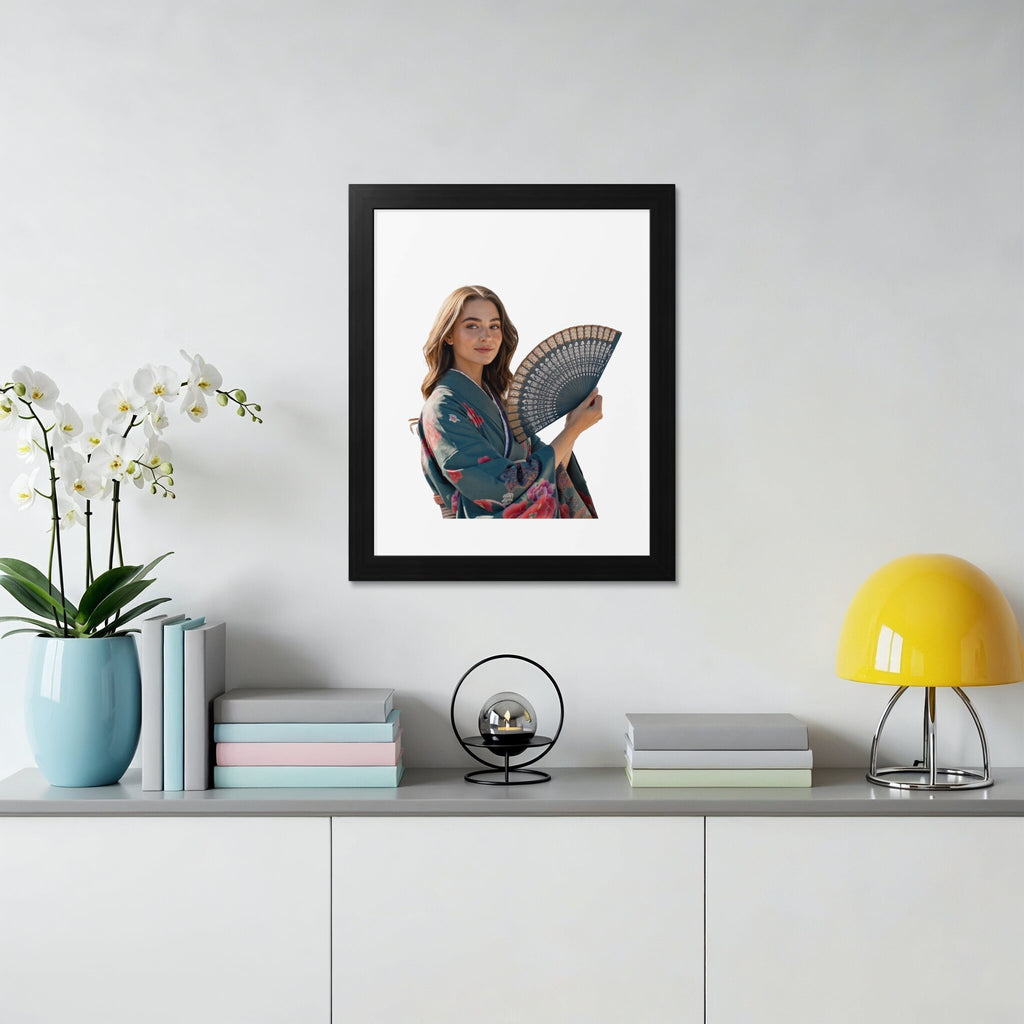 Woman in a floral kimono holding a black fan, framed on a wall.
