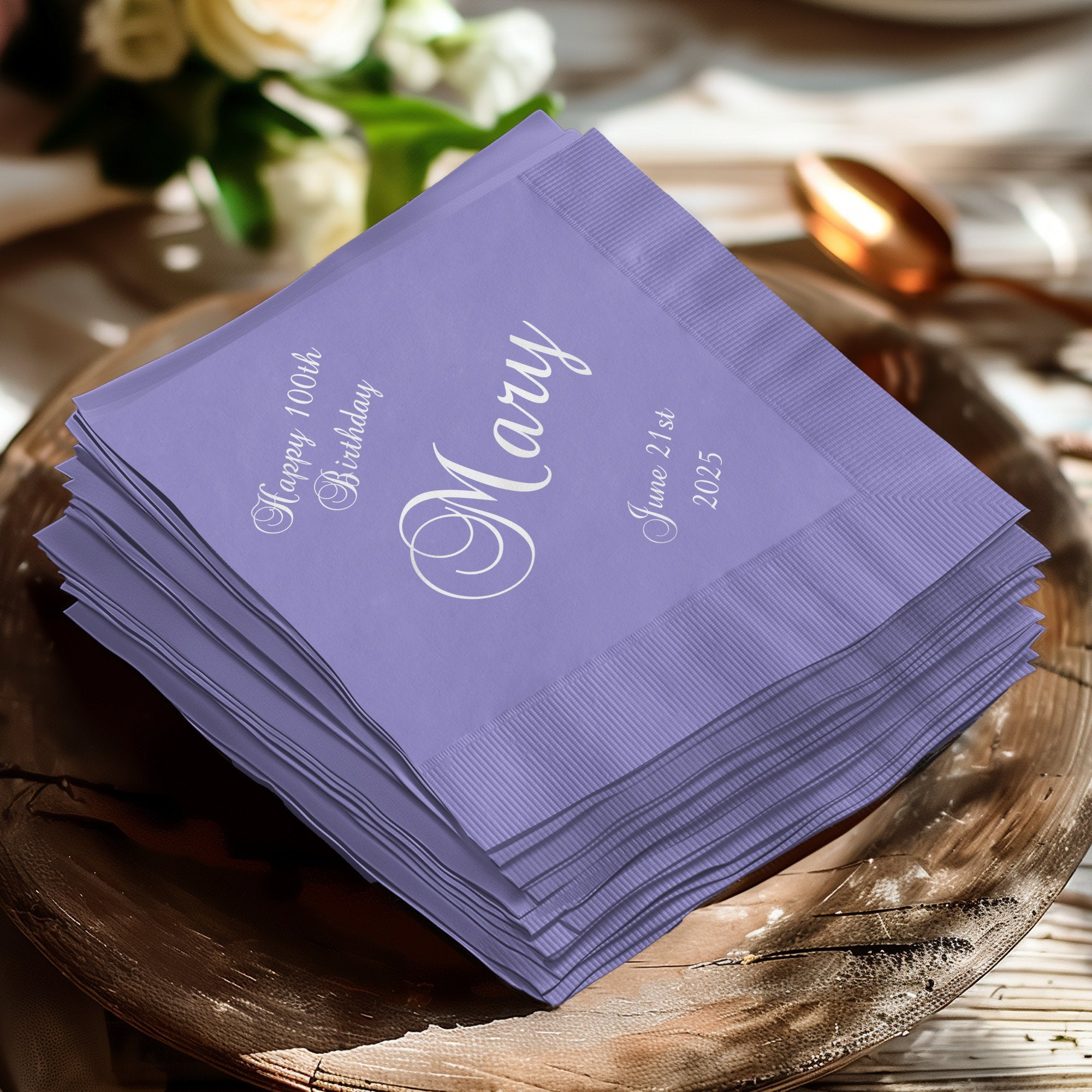 Lavender napkins for a 100th birthday with name and date.