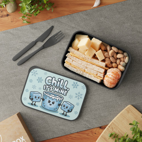 Lunchbox with sandwich, cheese, pistachios, and tangerines, featuring cute ice cubes.