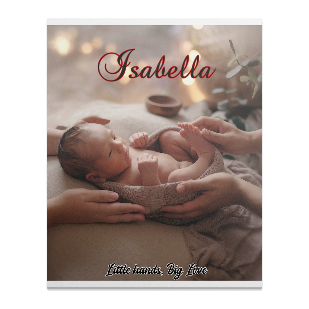 Newborn baby wrapped in blanket held by adult hands, "Isabella" and "Little hands, Big Love" text.