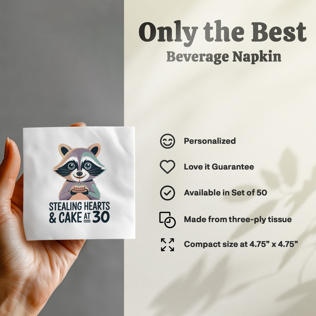 Beverage napkin with raccoon holding cake and "Stealing Hearts & Cake at 30" text.