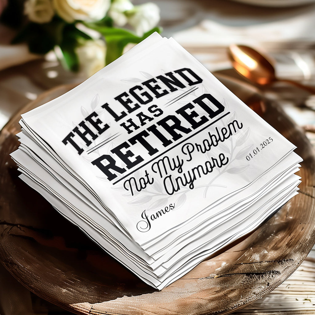 White napkin with "The Legend Has Retired Not My Problem Anymore James" and date.