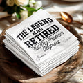 White napkin with "The Legend Has Retired Not My Problem Anymore James" and date.