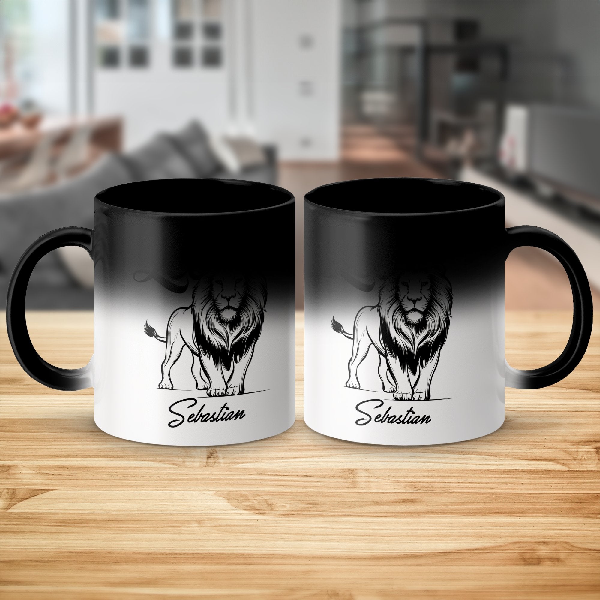 Two black and white magic mugs with a lion design and the name "Sebastian."