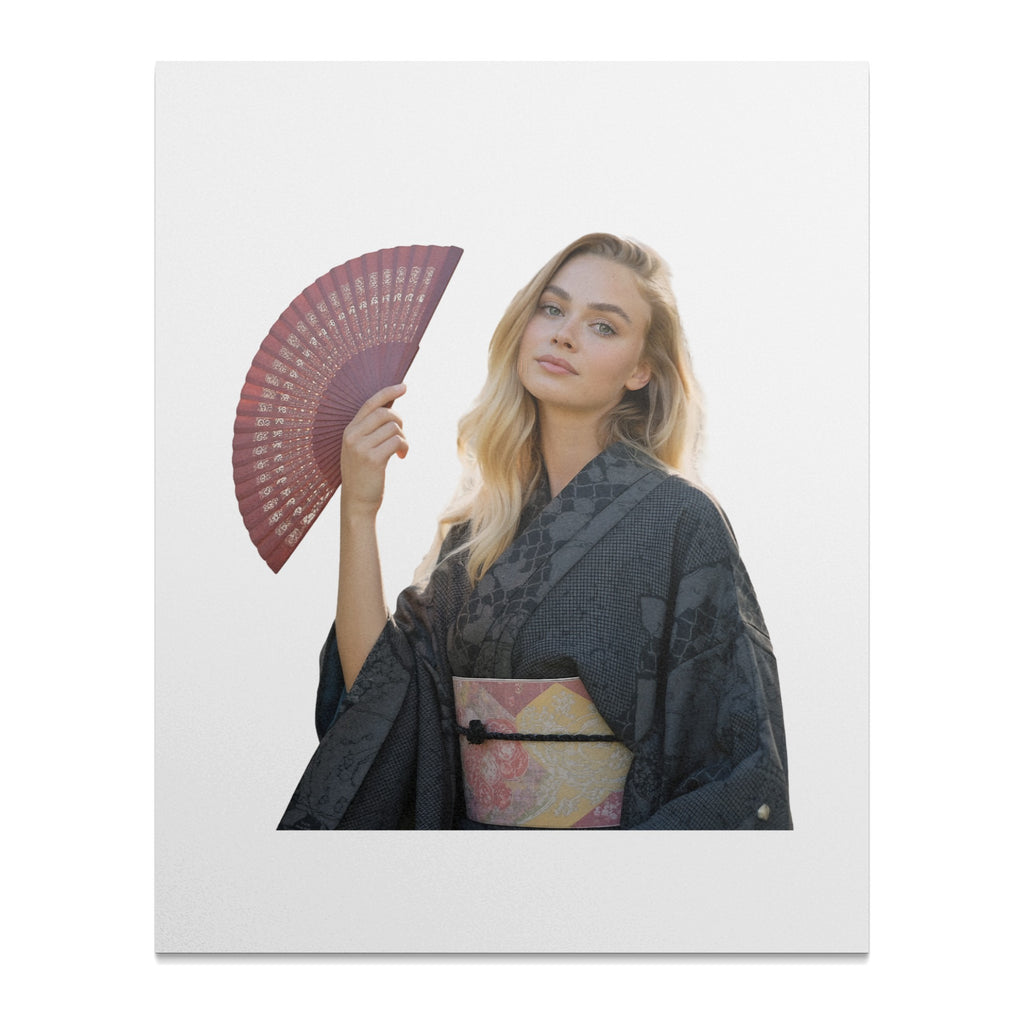 Woman in kimono holding a red fan against a white background.