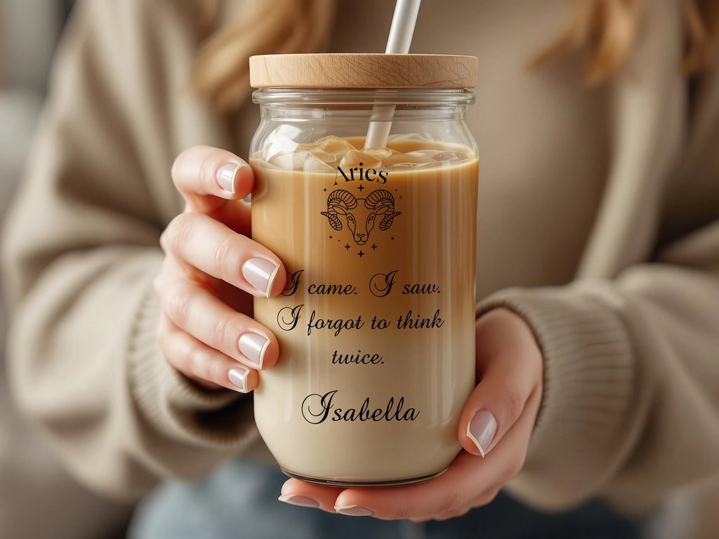Glass jar mug with straw, featuring Aries zodiac symbol and quote.
