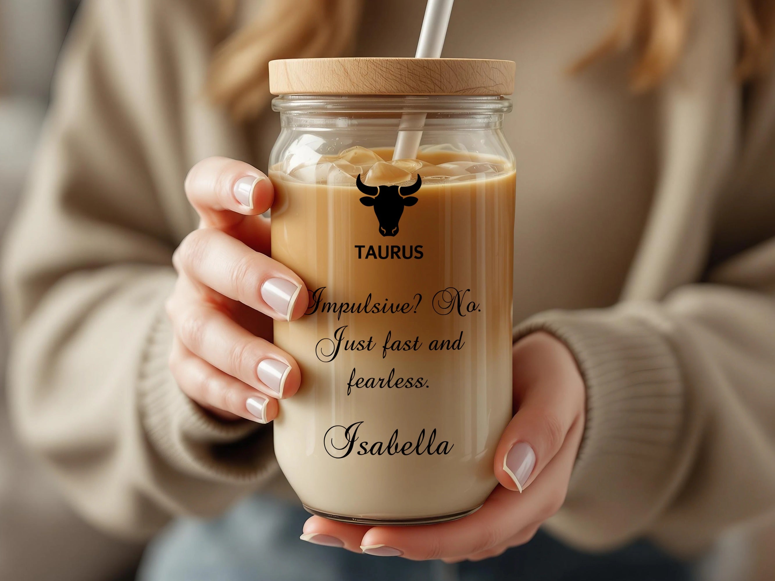 Glass tumbler with Taurus zodiac symbol and custom text "Impulsive! No. Just fast and fearless. Isabella."