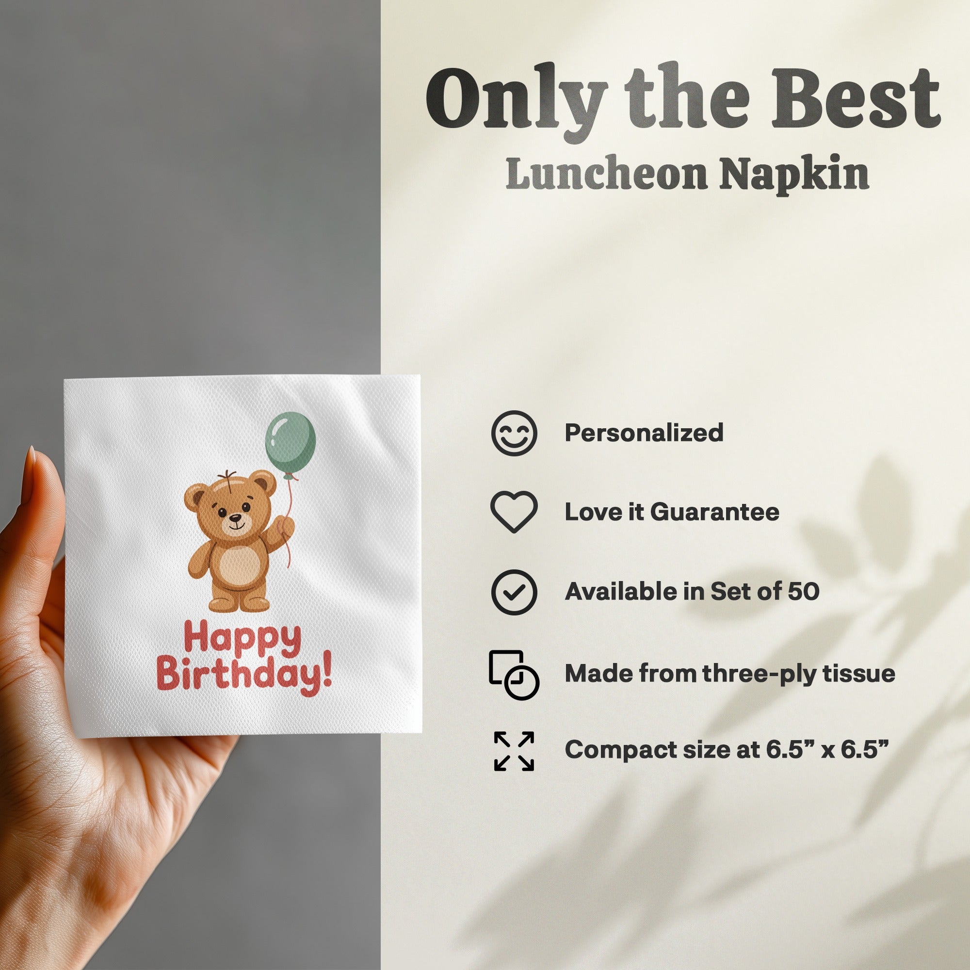 Teddy bear with balloon on white napkin that says "Happy Birthday!".