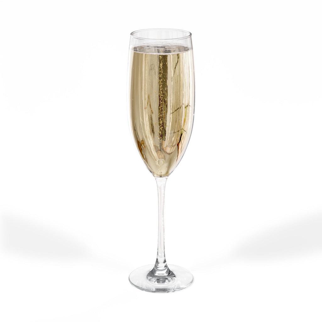 Tall flute of champagne with bubbles, isolated on a white background.