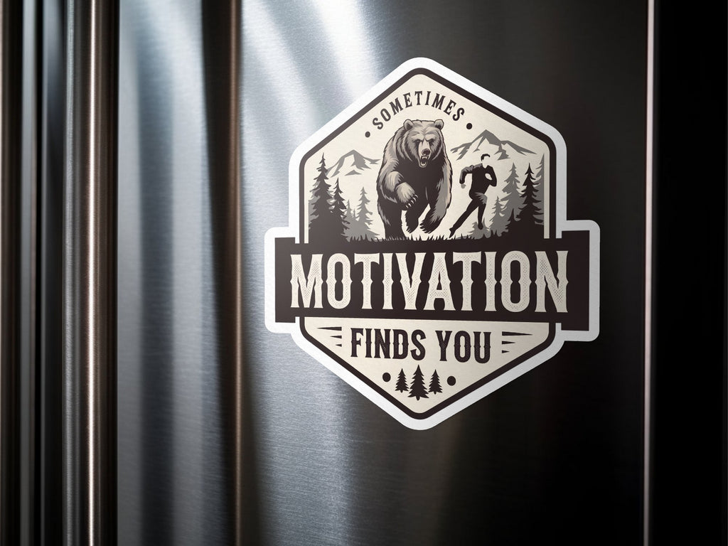 Bear and runner in mountains badge with "SOMETIMES MOTIVATION FINDS YOU" text.