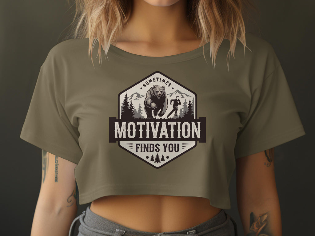 Olive green cropped t-shirt with hexagon graphic featuring bear, runner, and text.