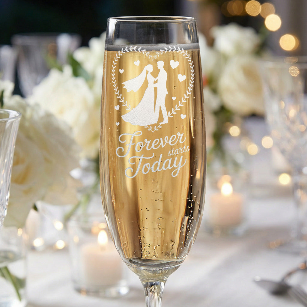 Champagne flute with wedding couple silhouette and text "Forever starts Today".