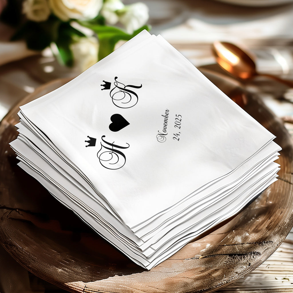 Stack of white napkins with black monogram "HK" and date "November 24, 2025".