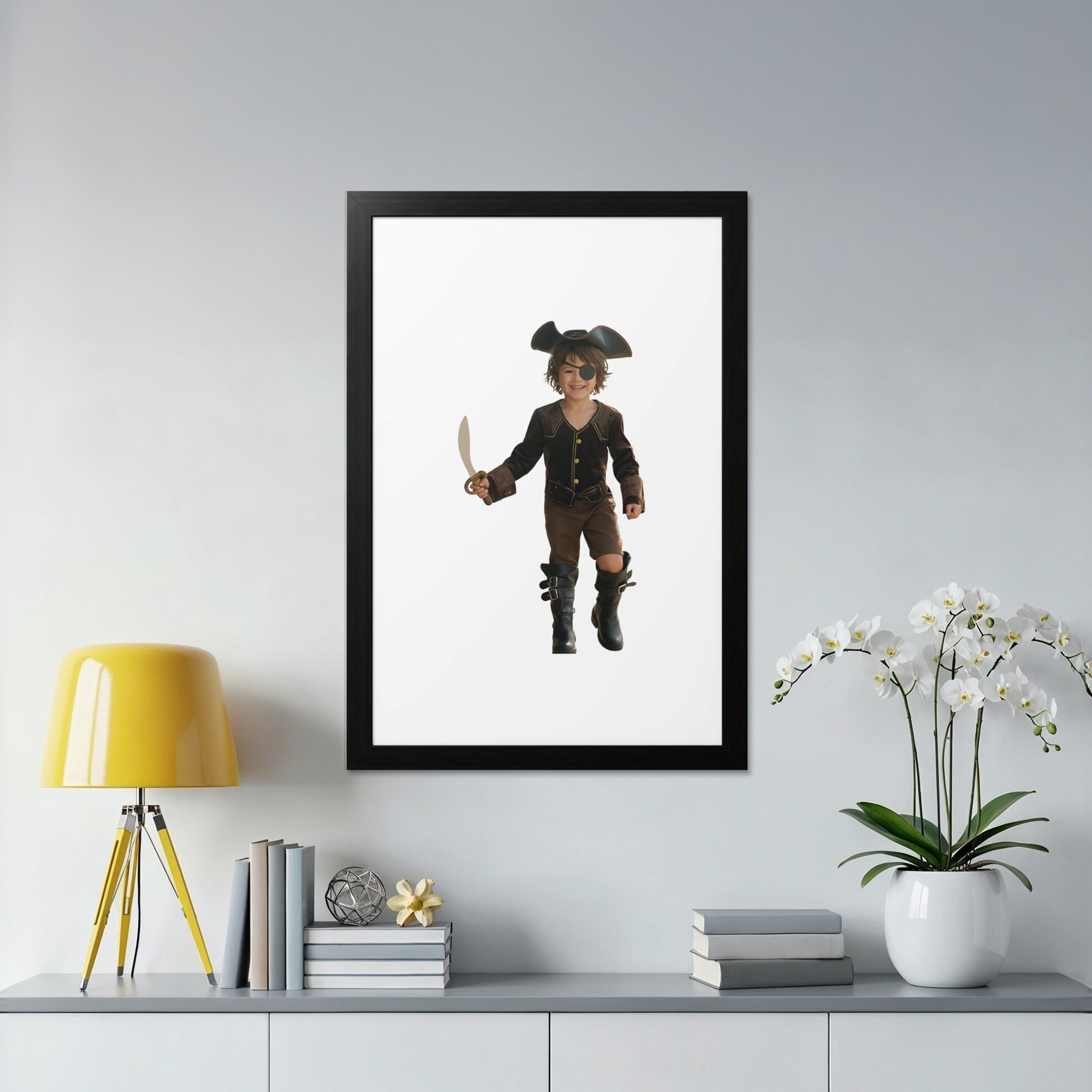 Child in pirate costume with sword and eye patch smiles, holding prop sword.