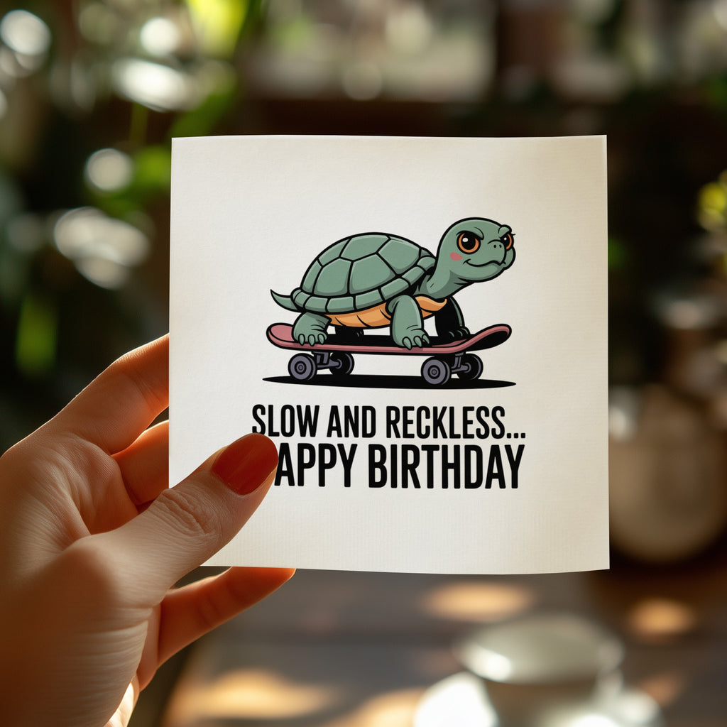 Turtle on skateboard greeting card with "SLOW AND RECKLESS... HAPPY BIRTHDAY" text.