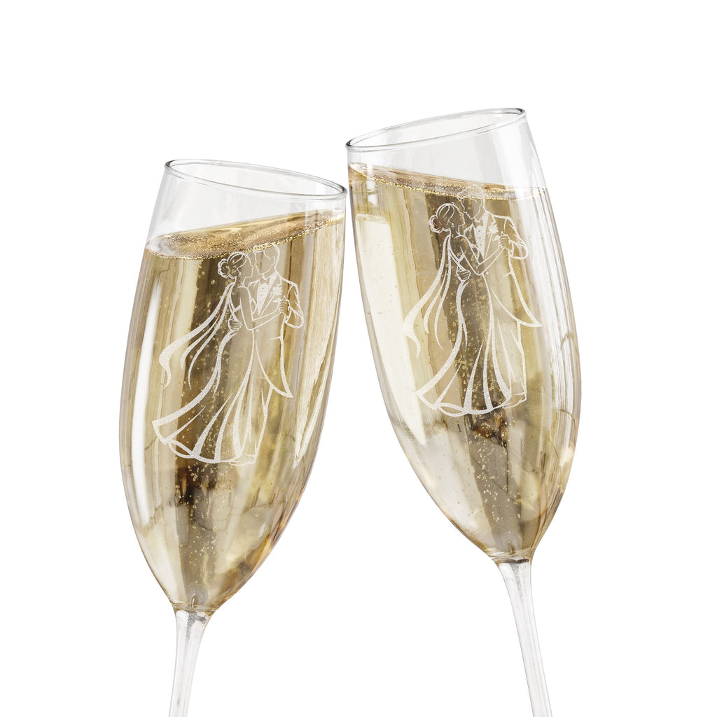 Two champagne flutes clinking, etched with a bride and groom.