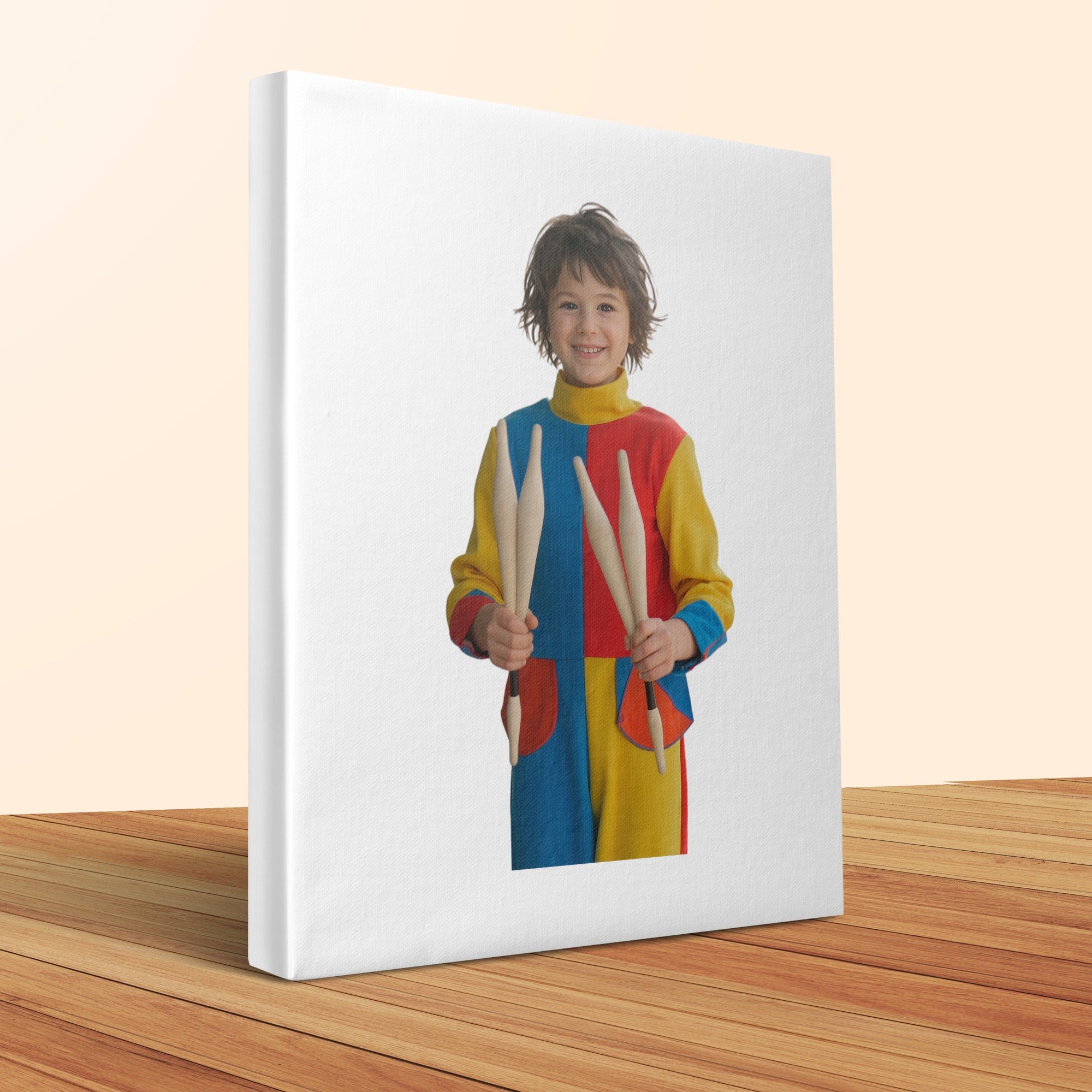 Boy in colorful costume holding juggling pins.