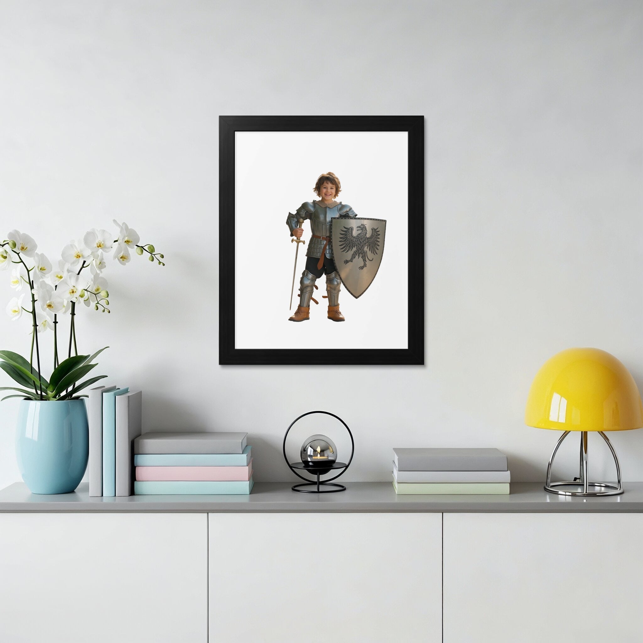 Child in knight costume with sword and shield, holding a shield with an eagle emblem.