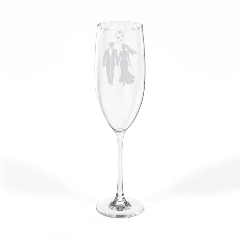 Champagne flute with etched silhouettes of a bride and groom.