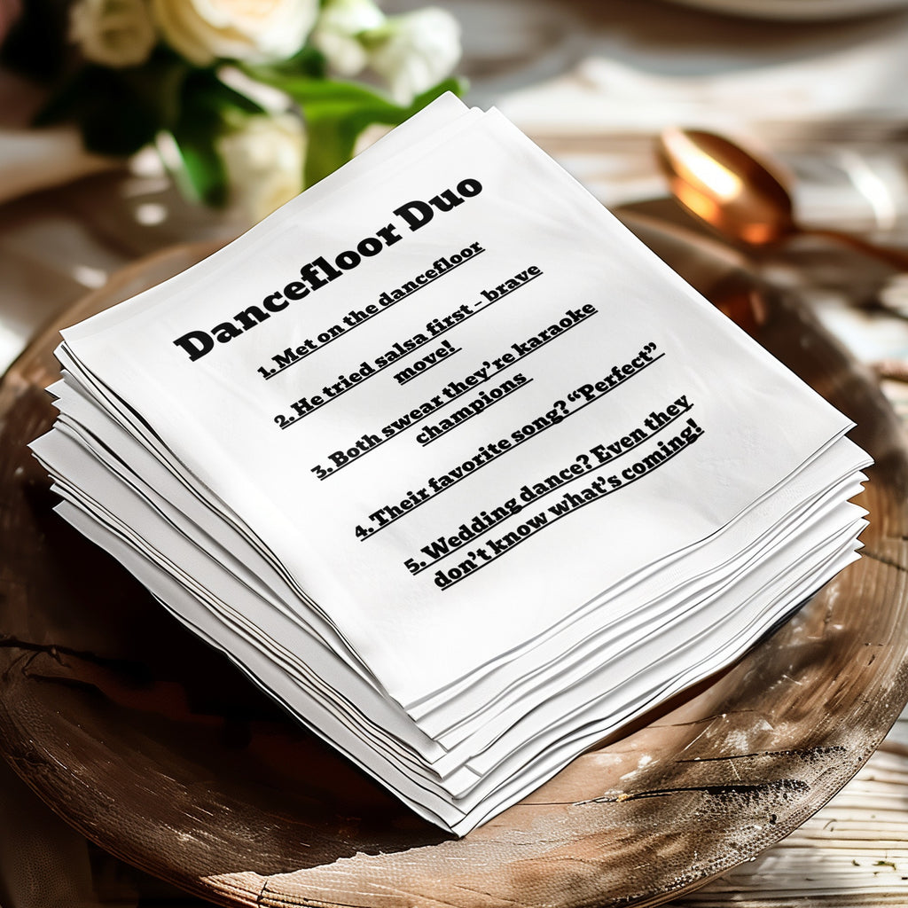 Stack of white napkins detailing a couple's "Dancefloor Duo" story.