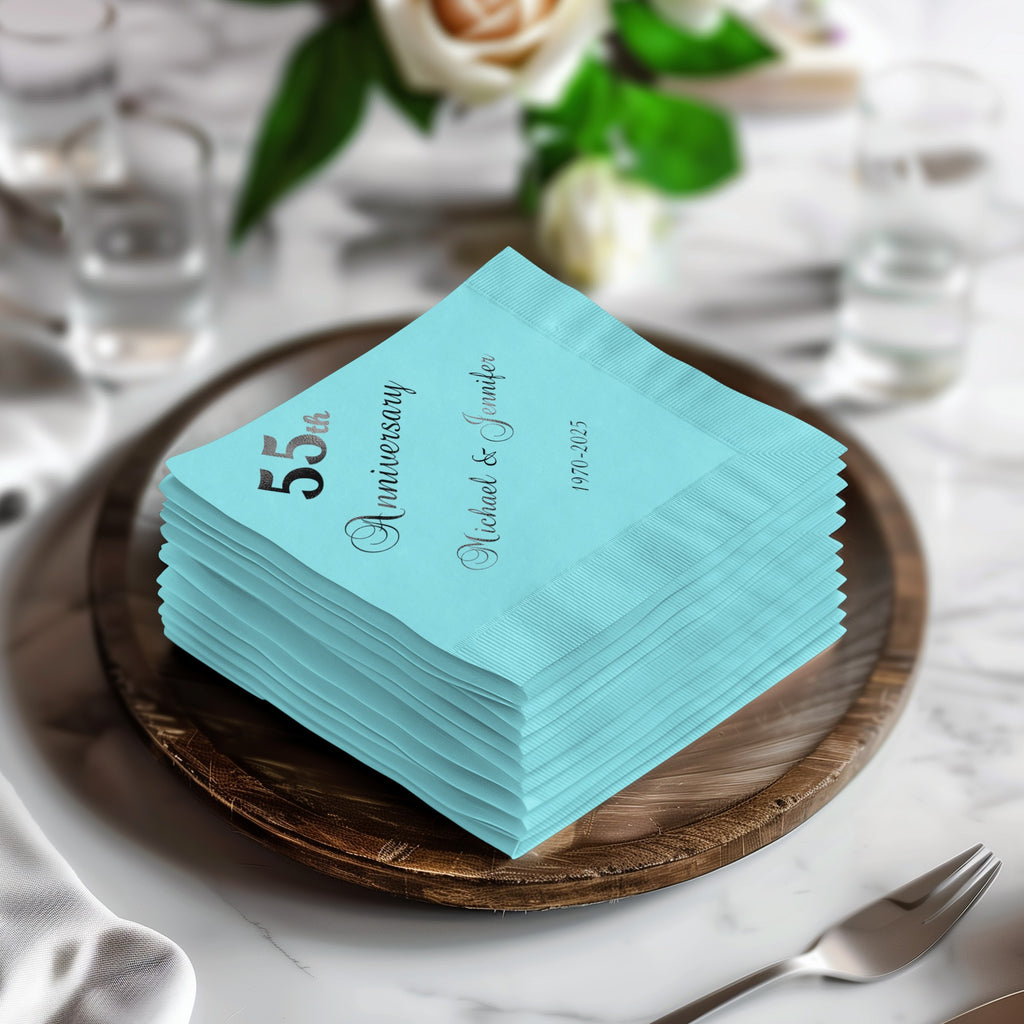 Stack of teal napkins for 55th anniversary, Michael & Jennifer, 1971-2025.